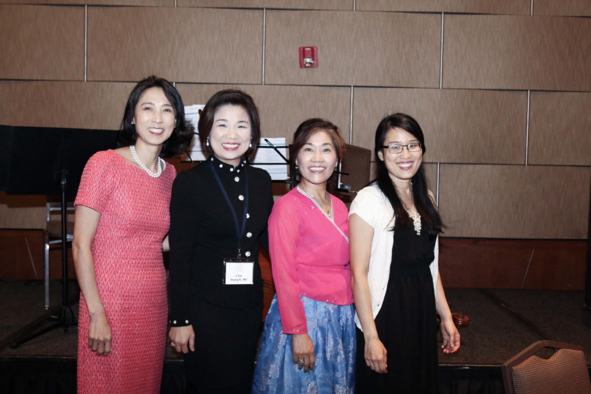 Members in formal group portrait