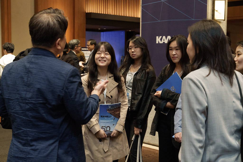 Students in conversation at convention